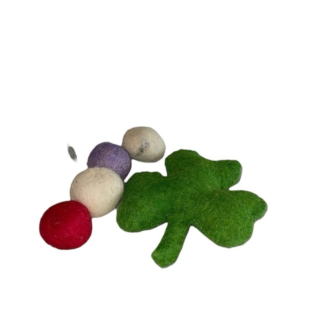 Handmade felt cat toys for any day 
5 small felt balls and a clover